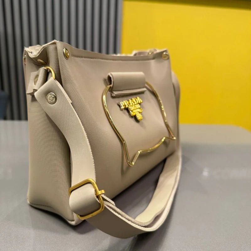 Beige Elegant Cat Handle Handbag for Girls & Ladies | Stylish Shoulder & Crossbody Bag with Gold Accents | Adjustable Strap - jnty.pk