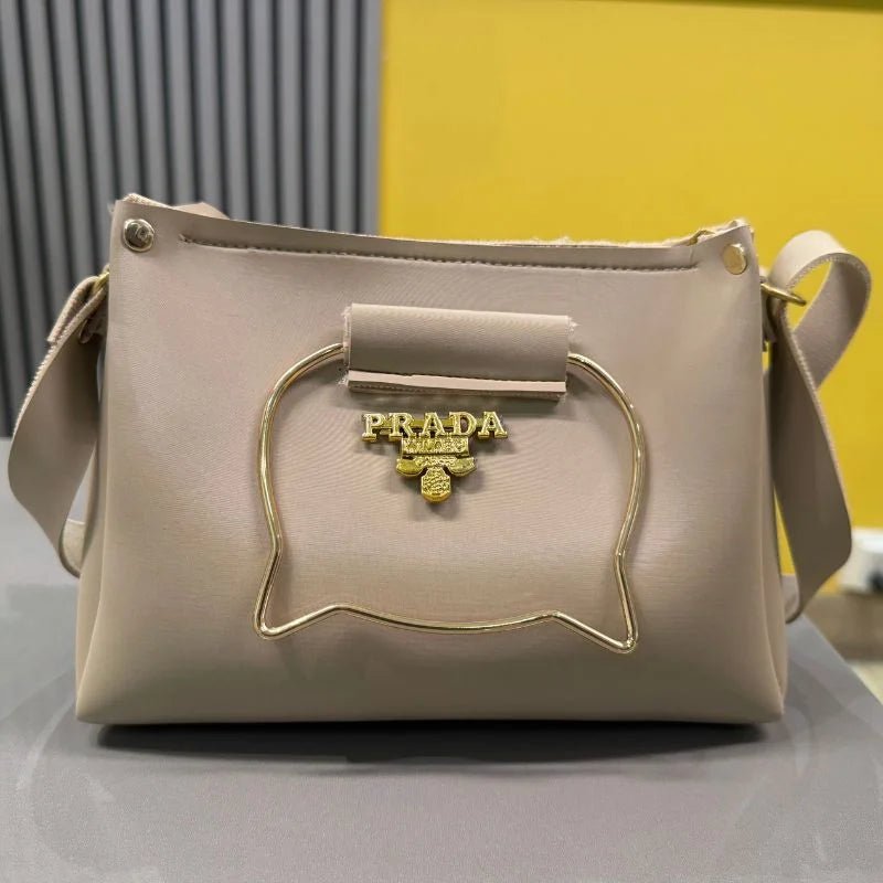 Beige Elegant Cat Handle Handbag for Girls & Ladies | Stylish Shoulder & Crossbody Bag with Gold Accents | Adjustable Strap - jnty.pk